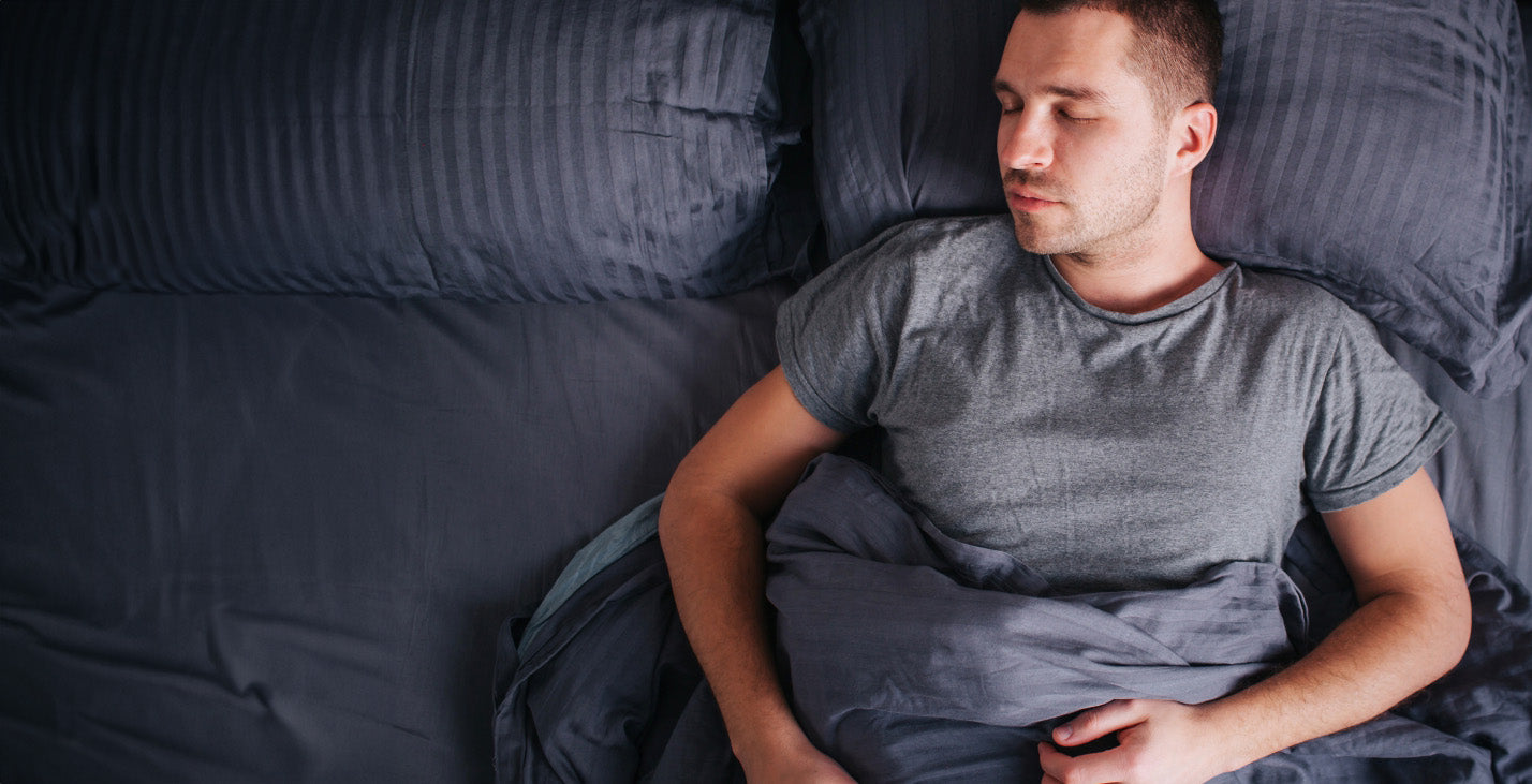 man_sleeping_in_bed.jpg